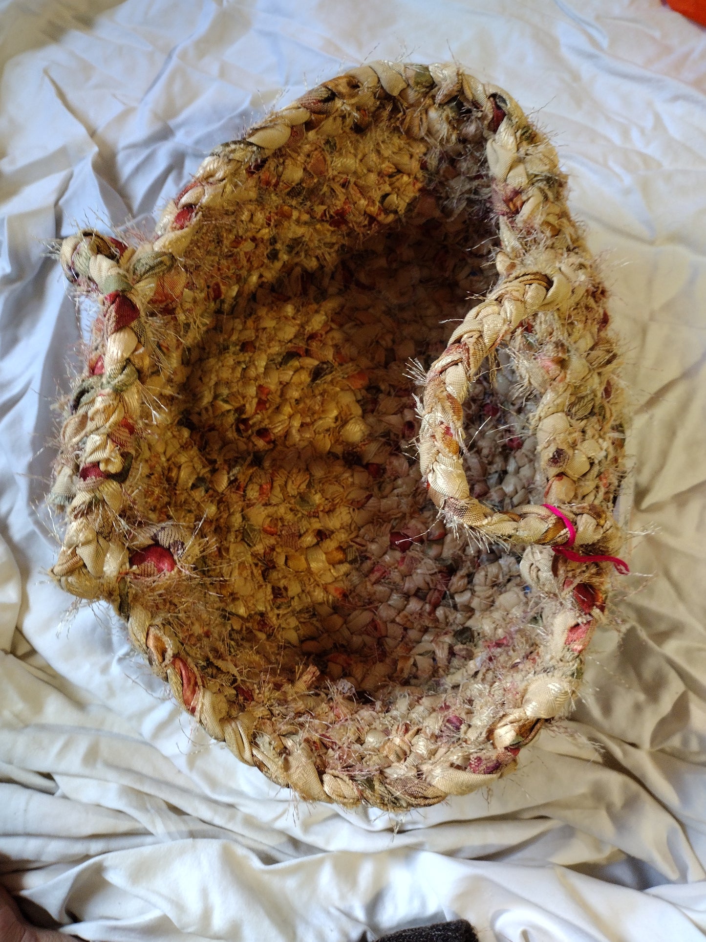 Baskets: 12 inch diameter hand braided basket with handles