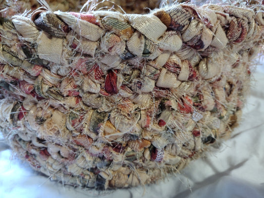 Baskets: 12 inch diameter hand braided basket with handles