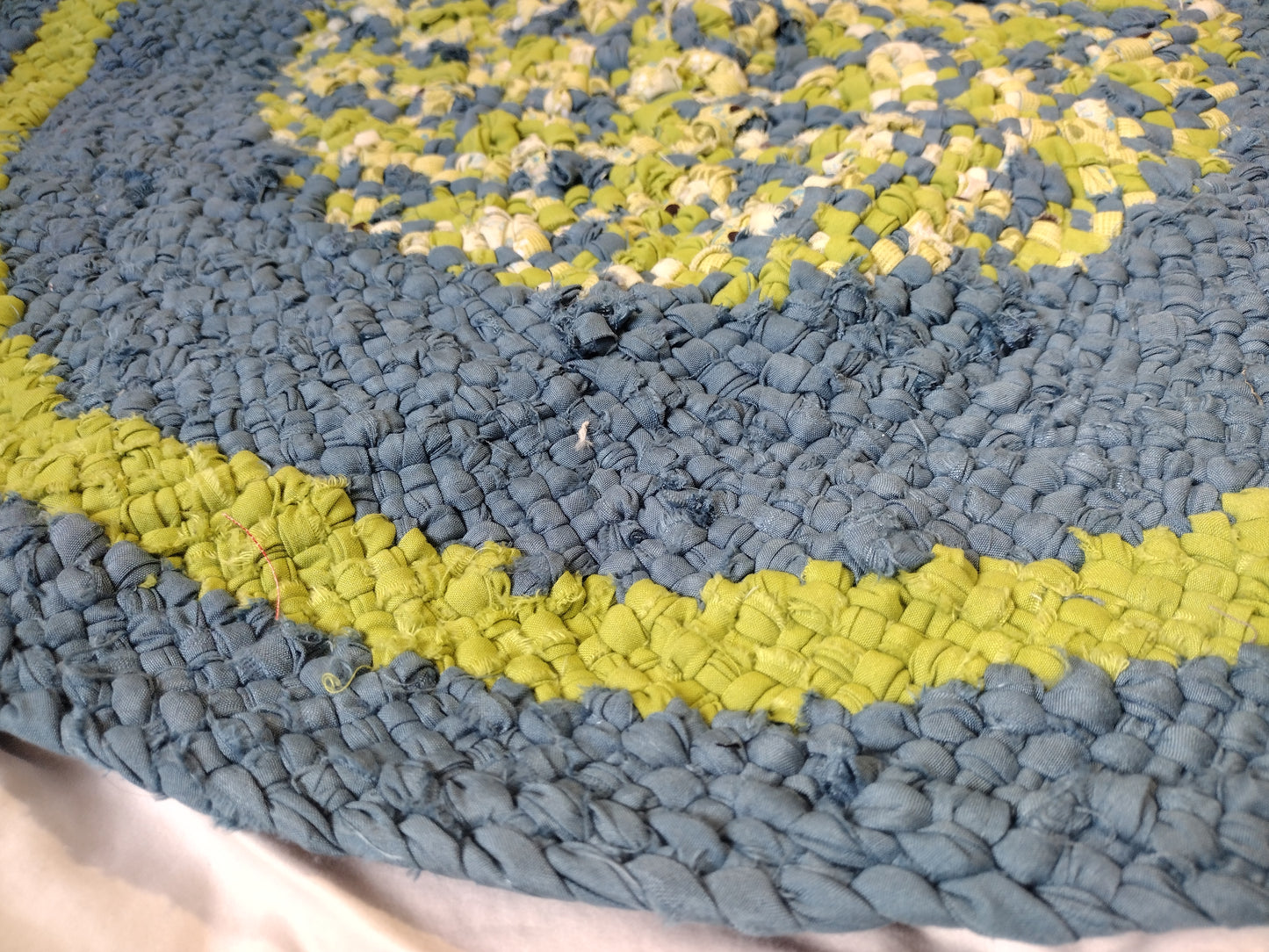 Rugs: 2 foot 3 inch hand braided round rug