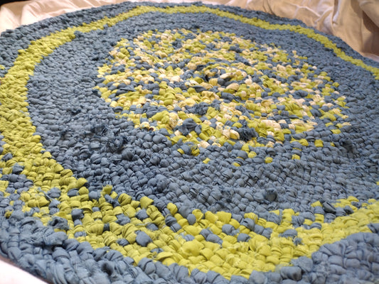 Rugs: 2 foot 3 inch hand braided round rug