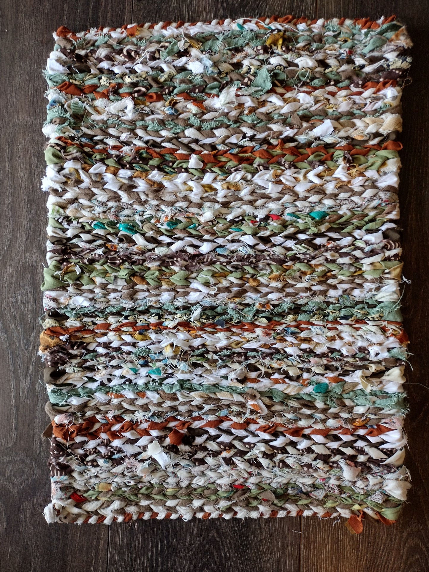 Rugs: 15 by 22 inch hand woven rectangular rug/mat