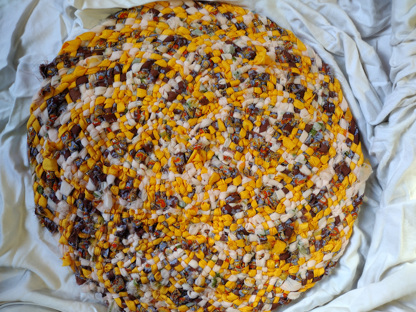 Rugs: 20 inch hand braided round rug